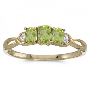 10k Yellow Gold Oval Peridot And Diamond Three Stone Ring