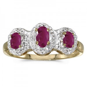 10k Yellow Gold Oval Ruby And Diamond Three Stone Ring