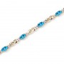 14K Yellow Gold Oval Blue Topaz and Diamond Bracelet